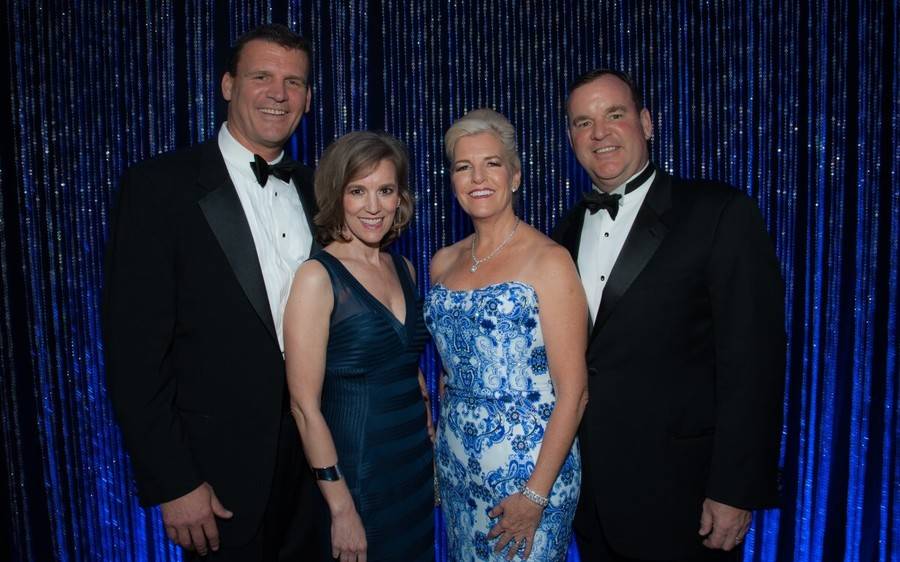 Two men and two women attend the 45th Annual Scripps Mercy Ball that raised $465,000.