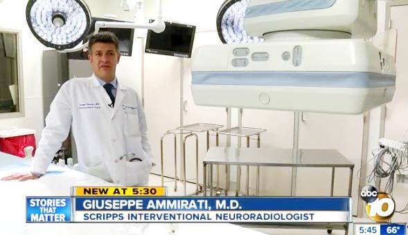 Giuseppe Ammirati, MD, Scripps interventional neuroradiologist conducts a local news interview in an operating room.