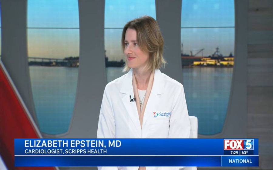 Dr. Elizabeth Epstein is sitting in a news studio speaking about the new cholesterol guidelines.