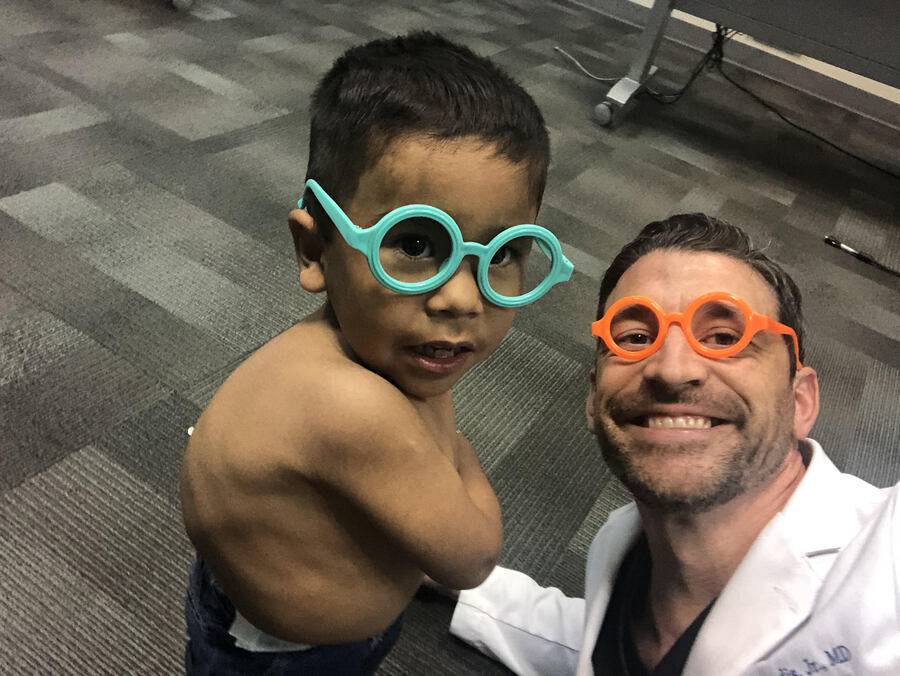 Gregory Mundis, MD photo on a medical mission.