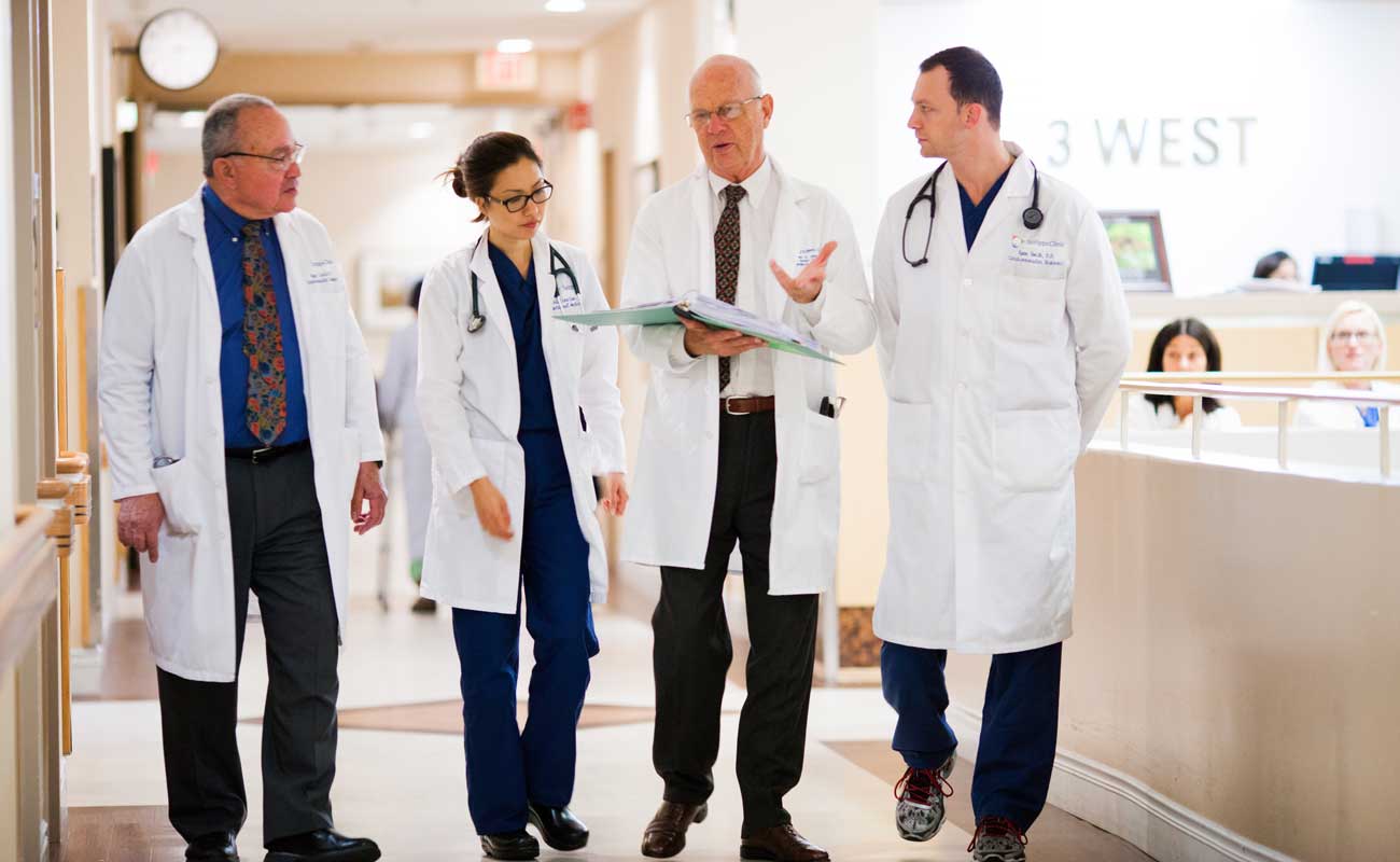 A group of Scripps LVAD physicians discuss patient care after receiving a referral.