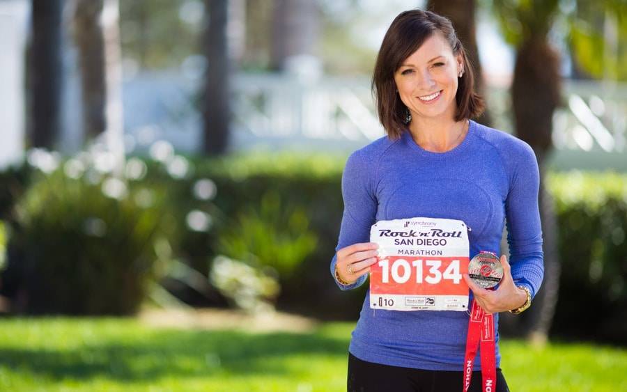 Kristy Castillo, who has type 1 diabetes, poses after completing San Diego marathon.