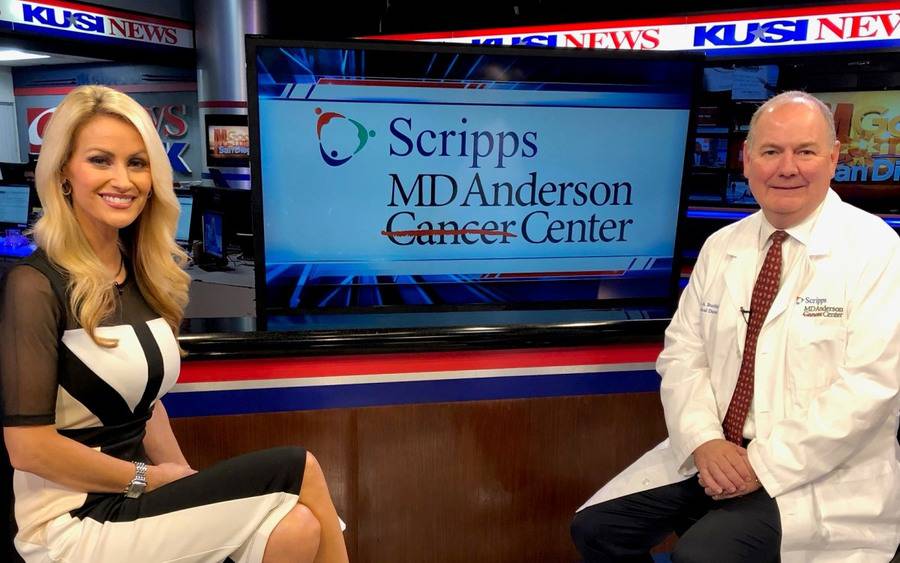 KUSI anchor Lauren Phinney on set with Dr. Thomas Buchholz,  medical director of Scripps MD Anderson Cancer Center.