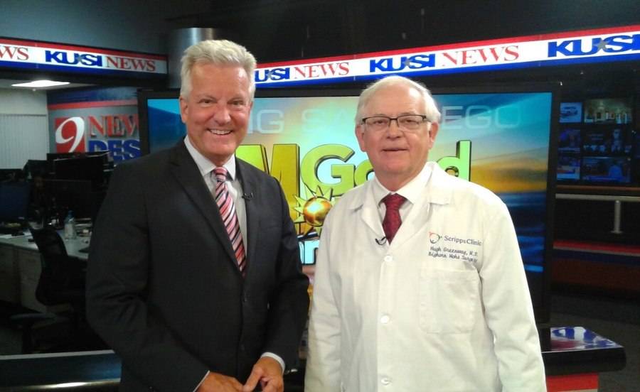 Hubert Greenway, MD, stands with a San Diego news anchor during his segment about skin cancer and prevention awareness.