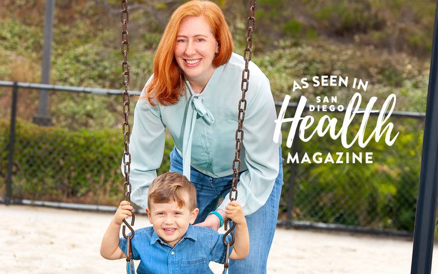 Olivia Smoak pictured with her son on the swing at the playground. Advanced life support saved her from a rare birth complication.