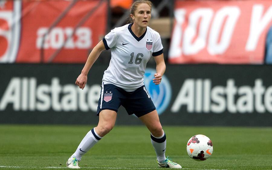 Rachel Buehler Van Hollebeke, MD playing soccer for the US Women's National Soccer team.