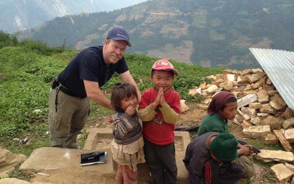 Scripps Health Medical Response Team member Tim Collins poses with children in a remote Nepal village damaged by the recent earthquakes. (Photo credit: Scripps Health)
View high-resolution image