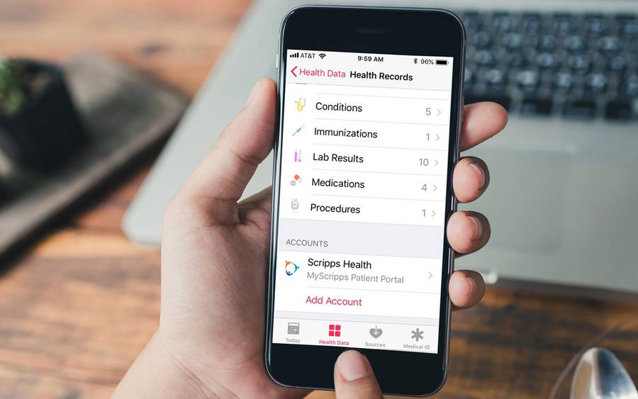 An app on a mobile phone accesses someone's medical records, with options for lab results and medications.