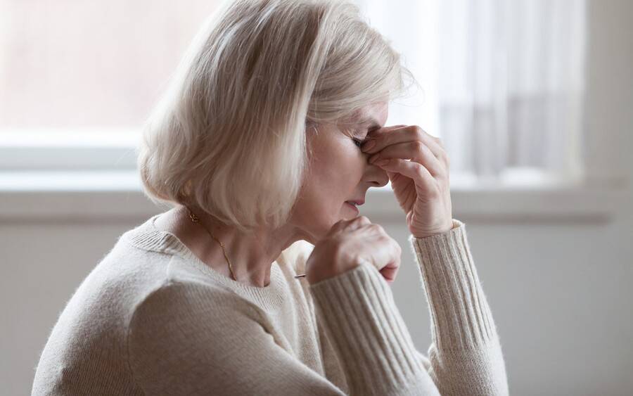 Older woman with confusion, memory loss, part of Alzheimer's symptoms. 