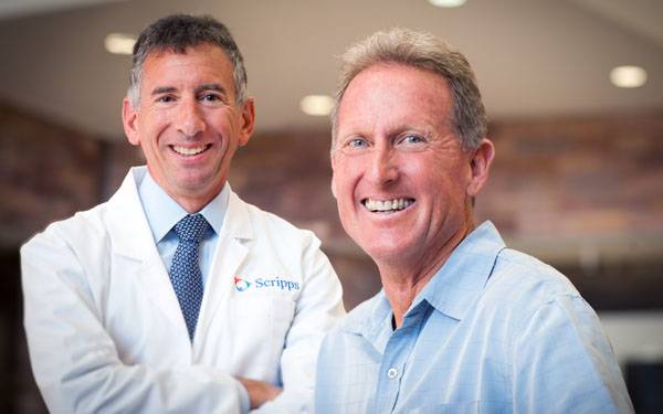 Distance runner Steve Scott is pictured with his physician, Dr. Carl Rossi of Scripps Proton Therapy Center.