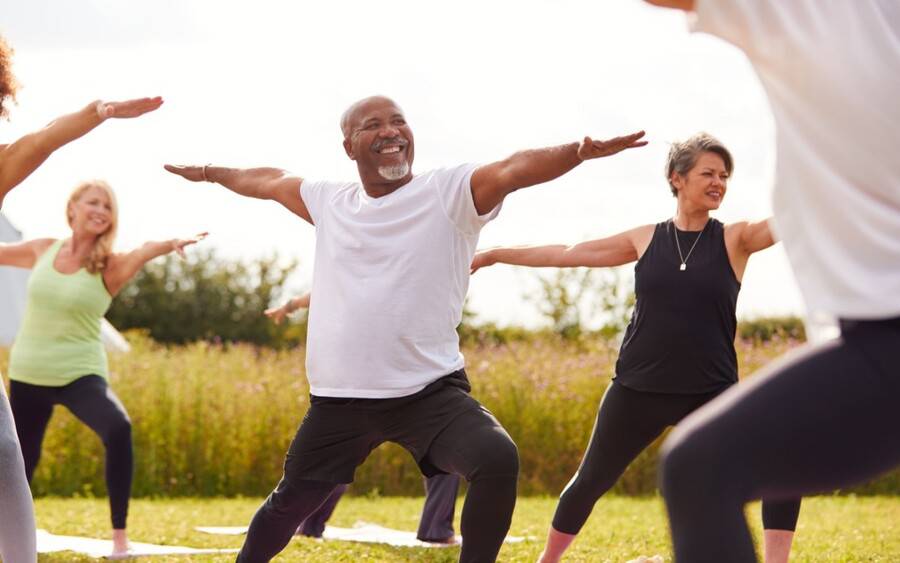 An African-American man over 50 years old exercises to stay healthy.