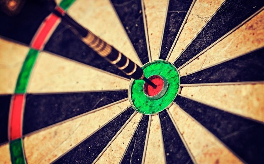 A dart driven firmly into the bullseye of a dartboard represents the importance of having goals detailed in the CEO blog.