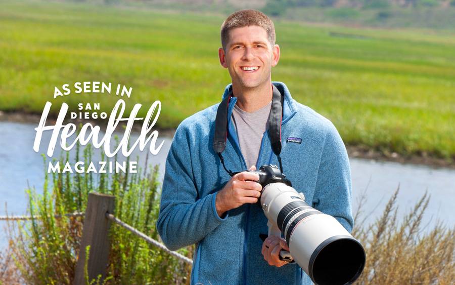 Tyler Kern, MD, a urologist at Scripps Clinic Jefferson in Oceanside, smiles on a trip outdoors photographing wildlife. SD Health Magazine