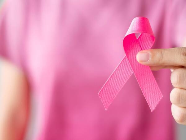 Breast cancer awareness symbol pink ribbon.