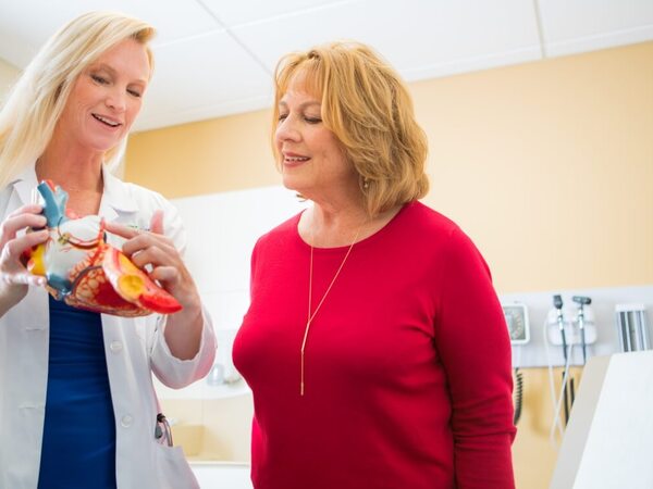 Christina Adams, MD, cardiologist at the Scripps Women's Heart Center at Scripps Memorial Hospital La Jolla, uses visuals to explain heart disease to patients.