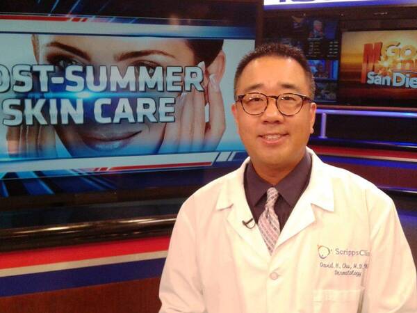 Scripps Clinic Dermatologist David Chu, MD, on the set of KUSI where he discussed post-summer sun damage treatments.