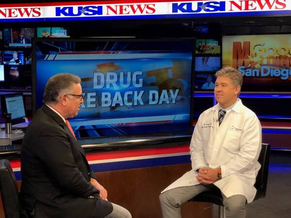 Ole Snyder, MD, physician chair of Scripps Opioid Stewardship Program, and KUSI anchor Carlos Amezcua discuss National Drug Take-Back Day, Oct. 27.