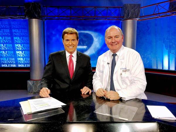 KUSI host Allen Denton and Dr. Thomas Buchholz, medical director Scripps MD Anderson, at KUSI studios for discussion on cancer rate falling.