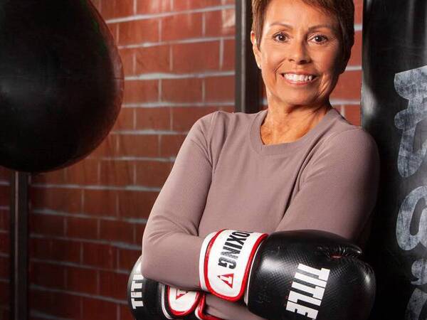 Renee Smith put her boxing gloves back on just a few weeks after brain implant surgery to combat Parkinson's disease.  