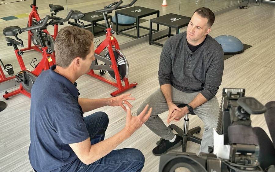 Police Sgt. Anthony Elliott (right) speaks with CBS 8 reporter Jeff Zevely at the Scripps Encinitas Outpatient Rehabilitation Center.