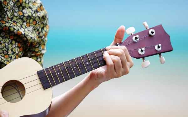 Breast cancer survivor story in Californian to share how her ukulele group is therapy.