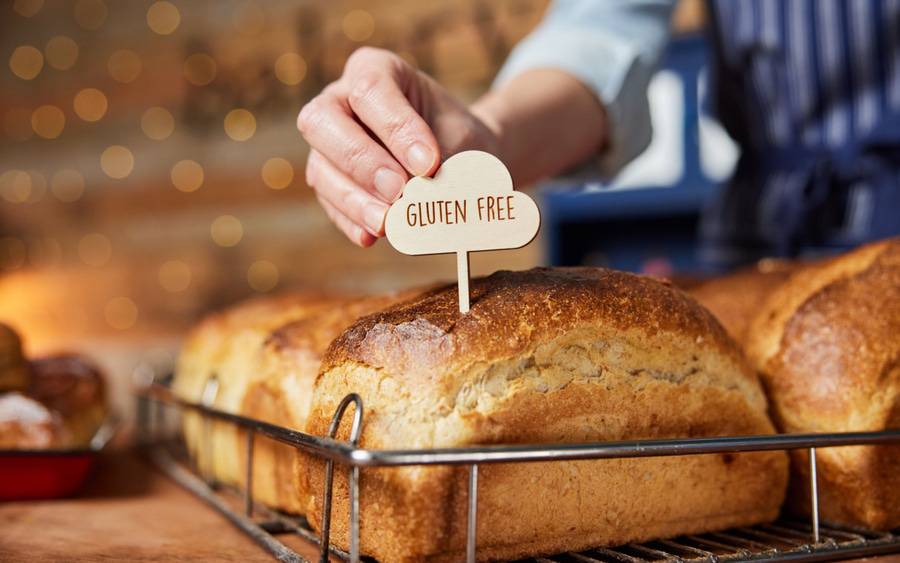 Gluten-free sign on bread indicates it's safe for people with celiac disease to eat.