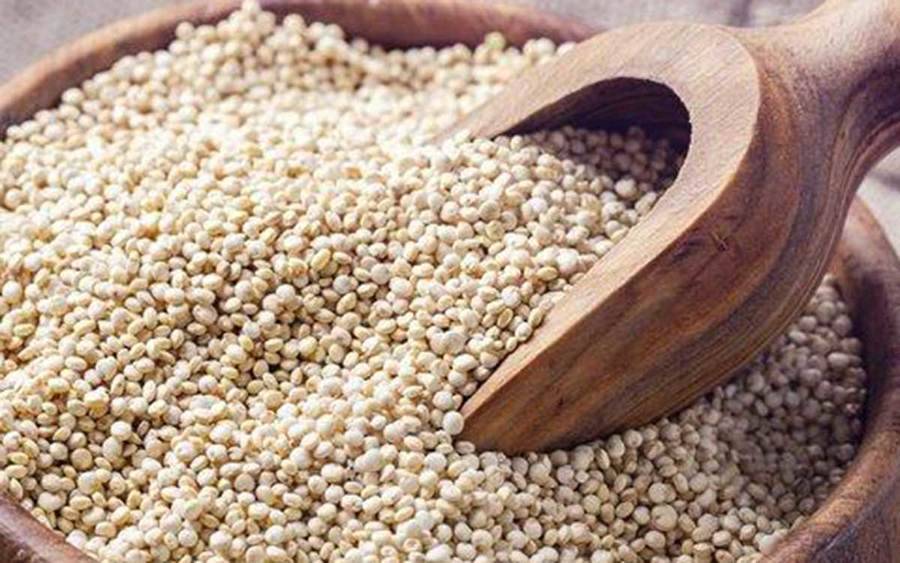 A bowl of quinoa represents how adding whole grains to your diet may help prevent cancer.