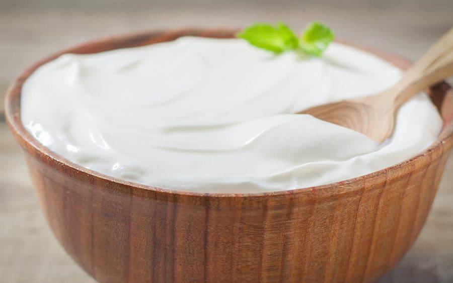 A bowl of yogurt represents how adding dairy to your diet may help prevent cancer.