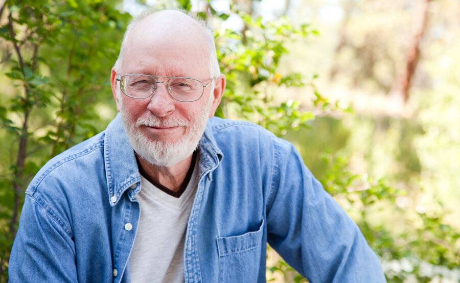 A mature man enjoys a day in nature representing the quality of life that can be had following leukemia treatment.