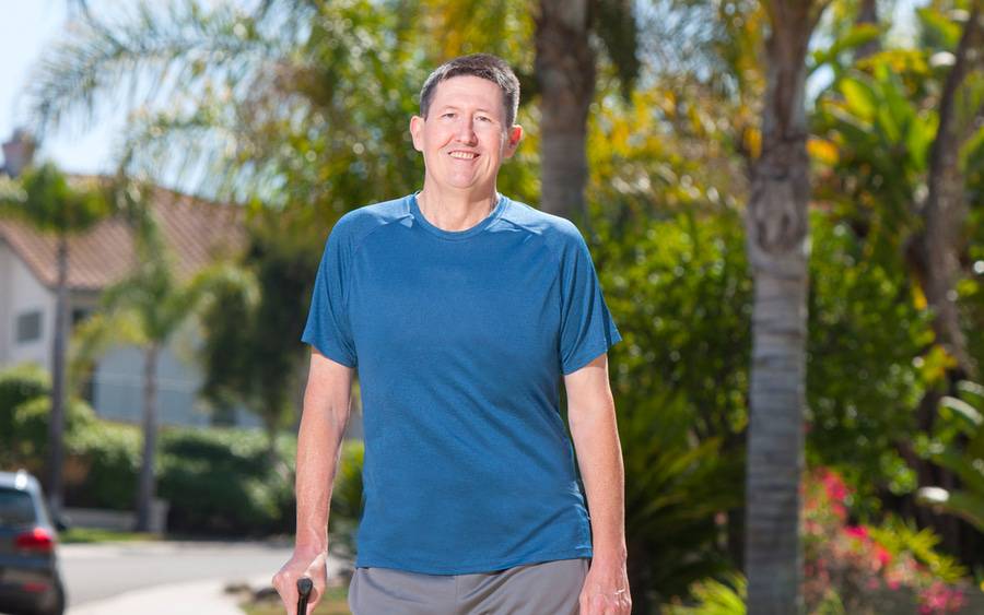 Erich Boldt, a Scripps MD Anderson cancer patient, stands upright and strong following successful cancer treatment.