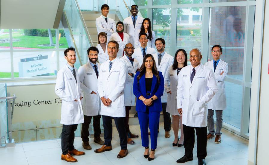 Members of the Scripps Cardiovascular Disease Fellowship Program gather for a photo at the Scripps Clinic John R. Anderson V Medical Pavilion in La Jolla.