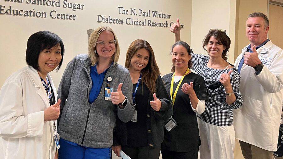 Staff of N. Paul Whittier Clinical Diabetes Research Center give a thumbs up - La Jolla, California