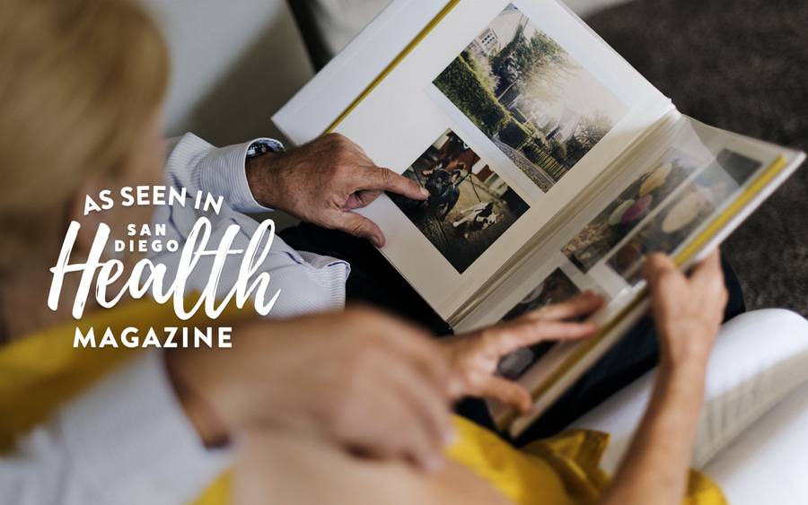 Older couple looking through a photo album