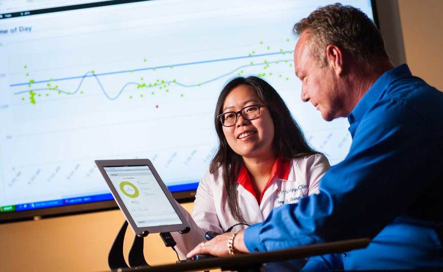 Endocrinologist Amy Chang, MD, faculty of Scripps Clinic Endocrinology, Diabetes and Metabolism Fellowship Program, consults with a patient