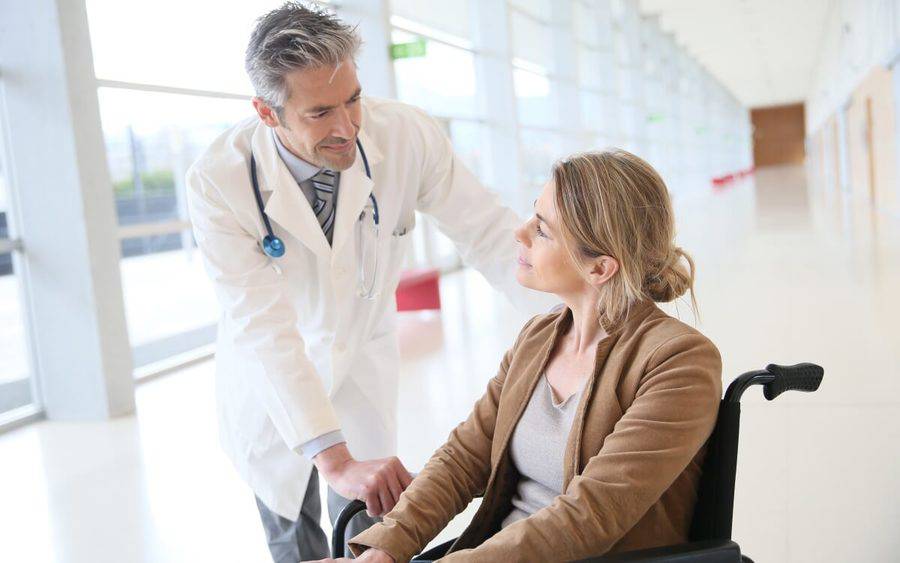 Patient looks at doctor after undergoing surgery.