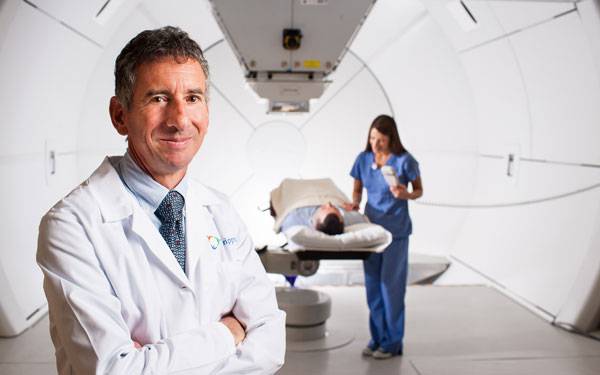 Dr. Carl Rossi in proton treatment room.