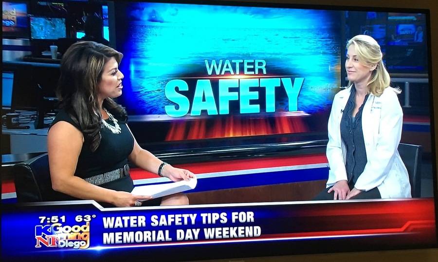 Jenny Davis, MD, Scripps Clinic Rancho Bernardo pediatrician discusses water safety tips with a news reporter.