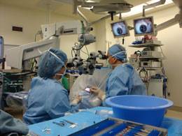Dr. Zablit performs cataract surgery on a patient from St. Vincent de Paul medical clinic.
