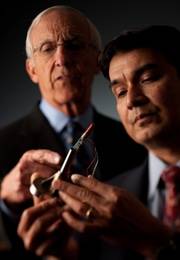 Dr. Clifford Colwell and Dr. Darryl D’Lima (right) examine the e-knee technology.