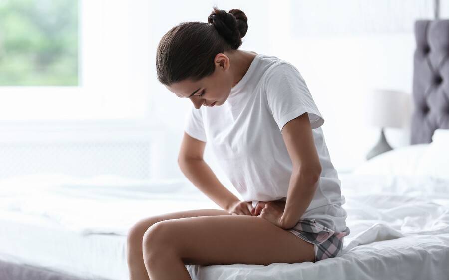 Woman with endometriosis coping with pelvic pain.