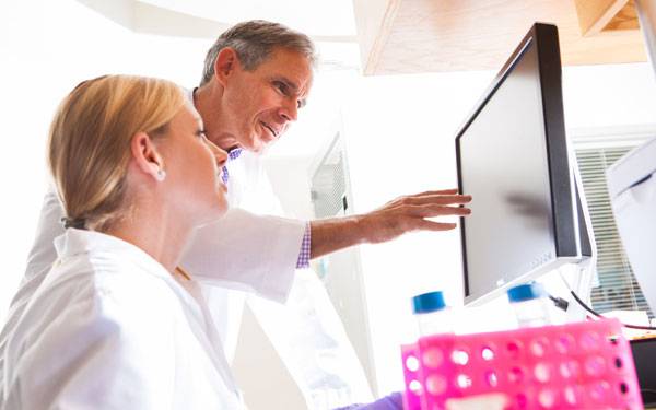 Eric Topol and Female Researcher STSI 600×375