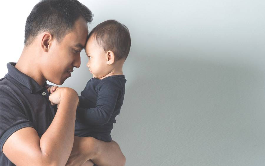 Father and son image illustrate men's health during Movember.