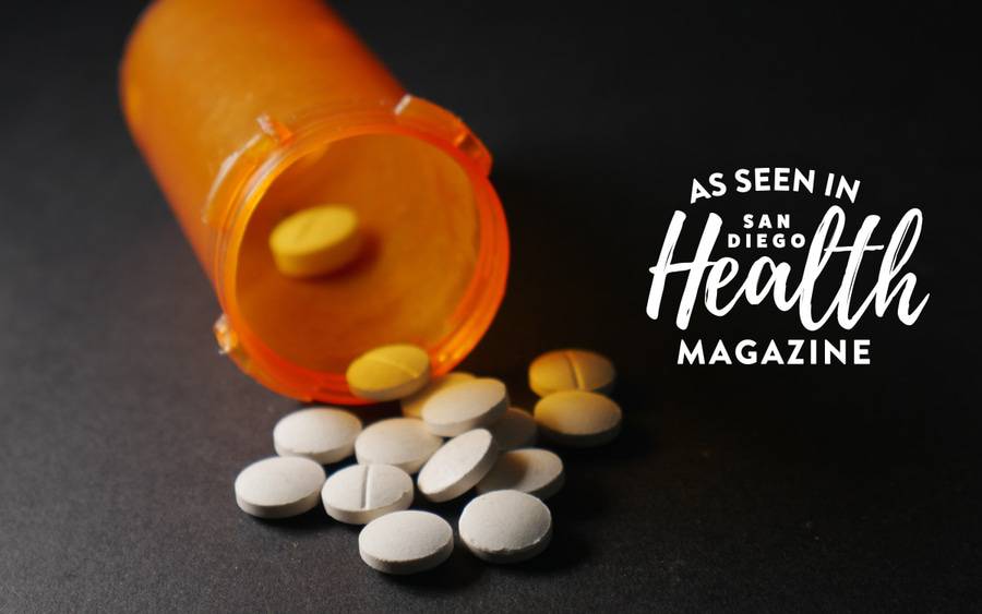 A pill bottle spilled over with fentanyl tablets. San Diego Health Magazine