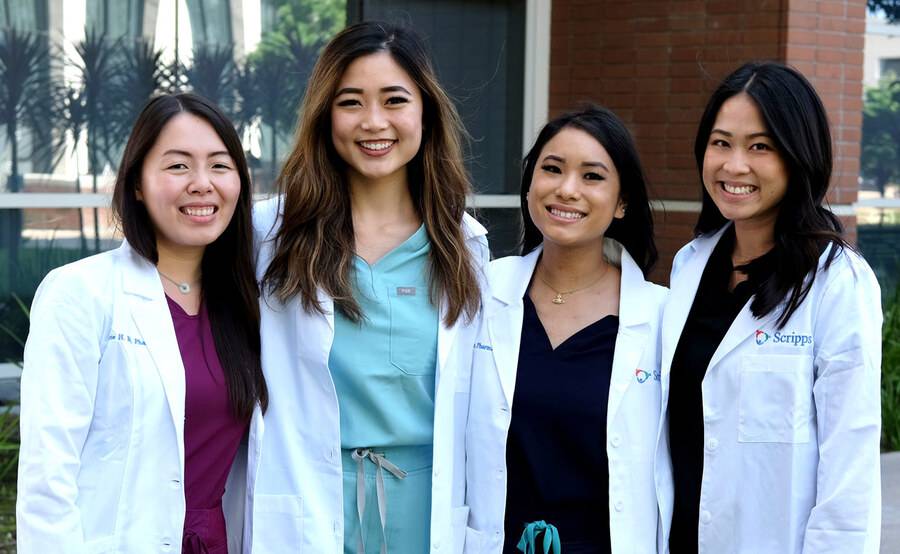 Four pharmacy residents take a break outside and pose for a group photo at Scripps in La Jolla.