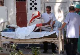 Scripps volunteers treating patient in Haiti.