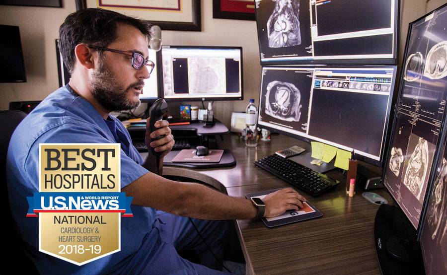 Scripps Clinic cardiologist Jorge Gonzalez, MD, reviews the results of a patient's imaging tests.
