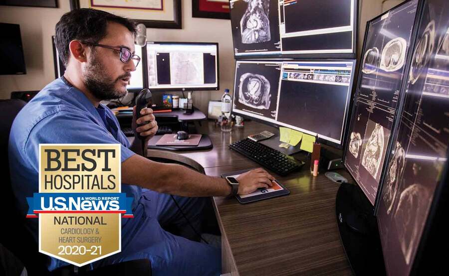 Scripps Clinic cardiologist Jorge Gonzalez, MD, reviews the results of a patient's imaging tests.