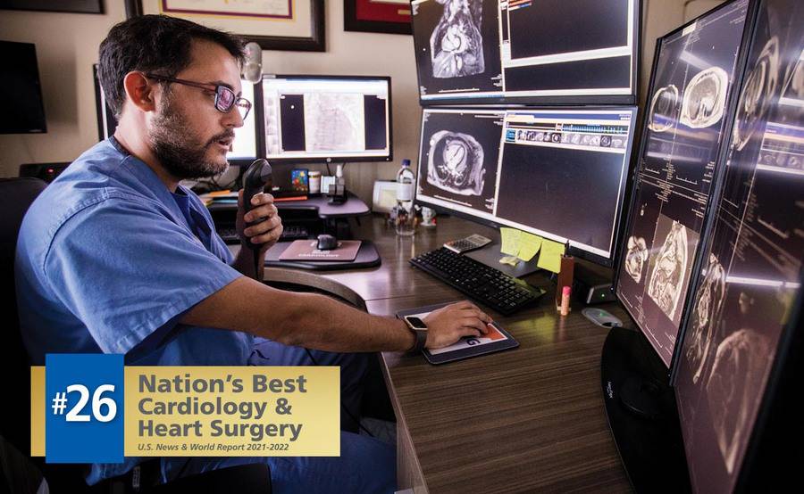 Scripps Clinic cardiologist Jorge Gonzalez, MD, reviews the results of a patient's imaging tests.