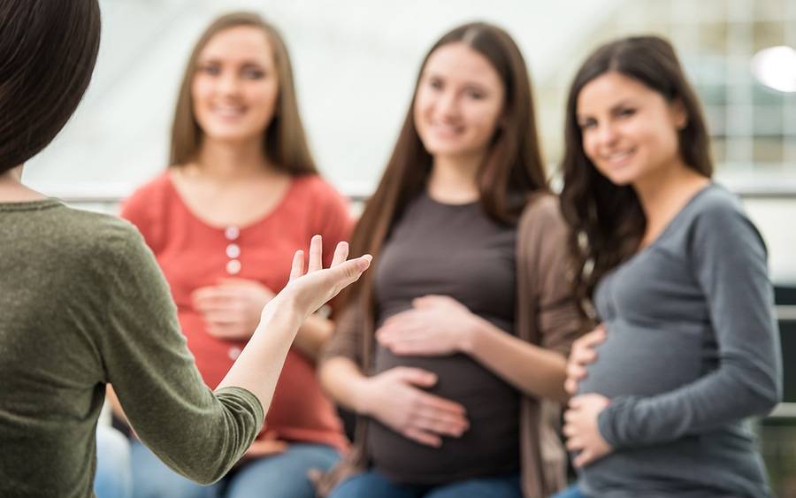 Pregnant women in class