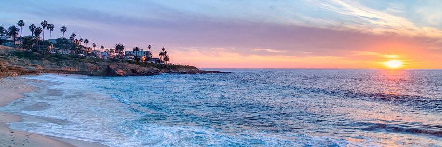 A sunset view of La Jolla shores represents one of the beautiful locations offering hotel and lodging discounts for out-of-town patients.